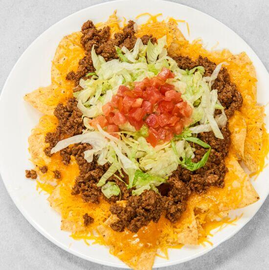 Chips & Cheese Supreme w/ 2 sour cream Friday Special