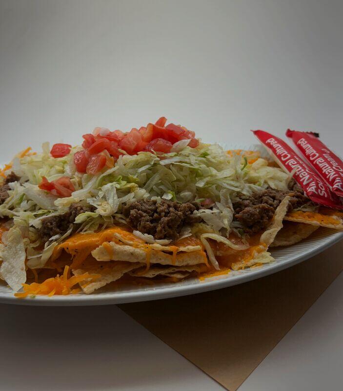 Chips & Cheese Supreme w/ 2 sour cream